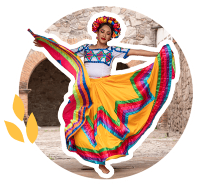 Hispanic dancer with bright colored skirt flowing with arm movement.