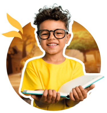 Young student holding a book open.