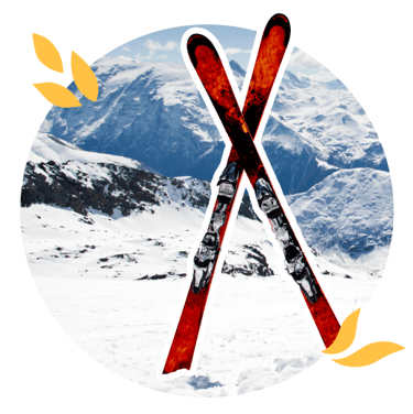 Skis stuck upright in the snow with a mountainous background. Skis stuck upright in the snow with a mountainous background.