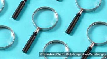 Magnifying glasses over a blue background