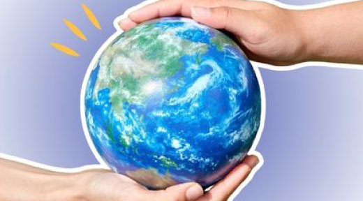 Earth with hands holding it at the top and bottom.